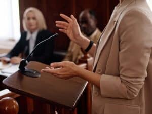 A personal injury attorney presenting her case before a female judge in court.